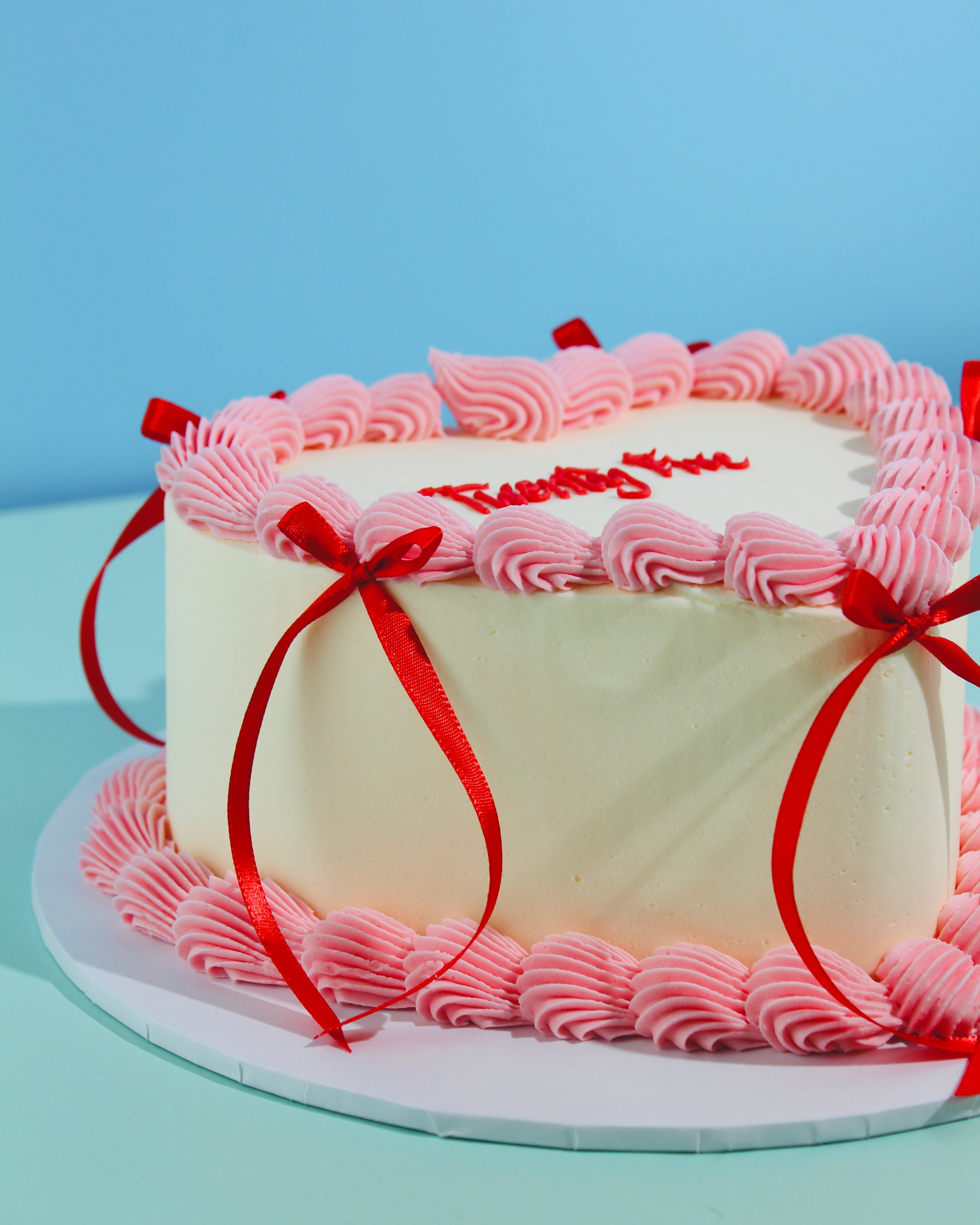 Heart-Shaped Mini Message Bow Cake