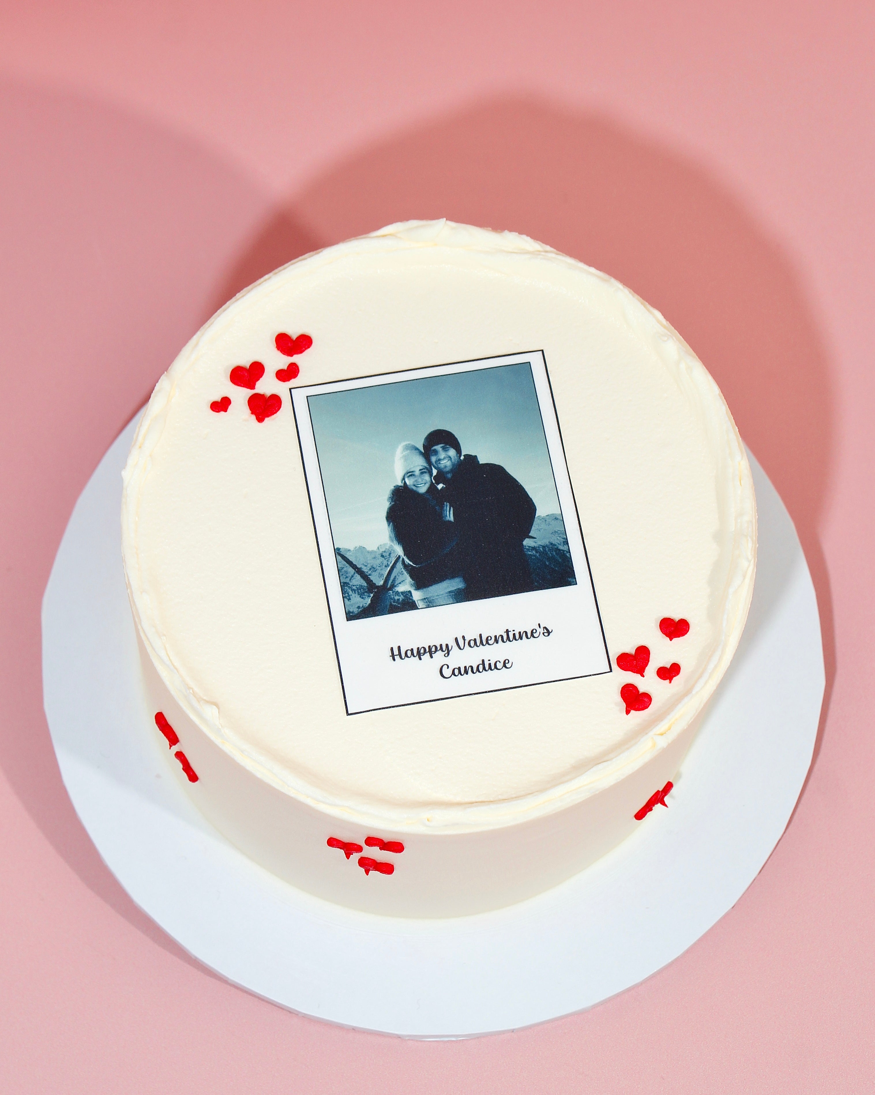 Valentine’s photo cake with personalised message and red heart accents