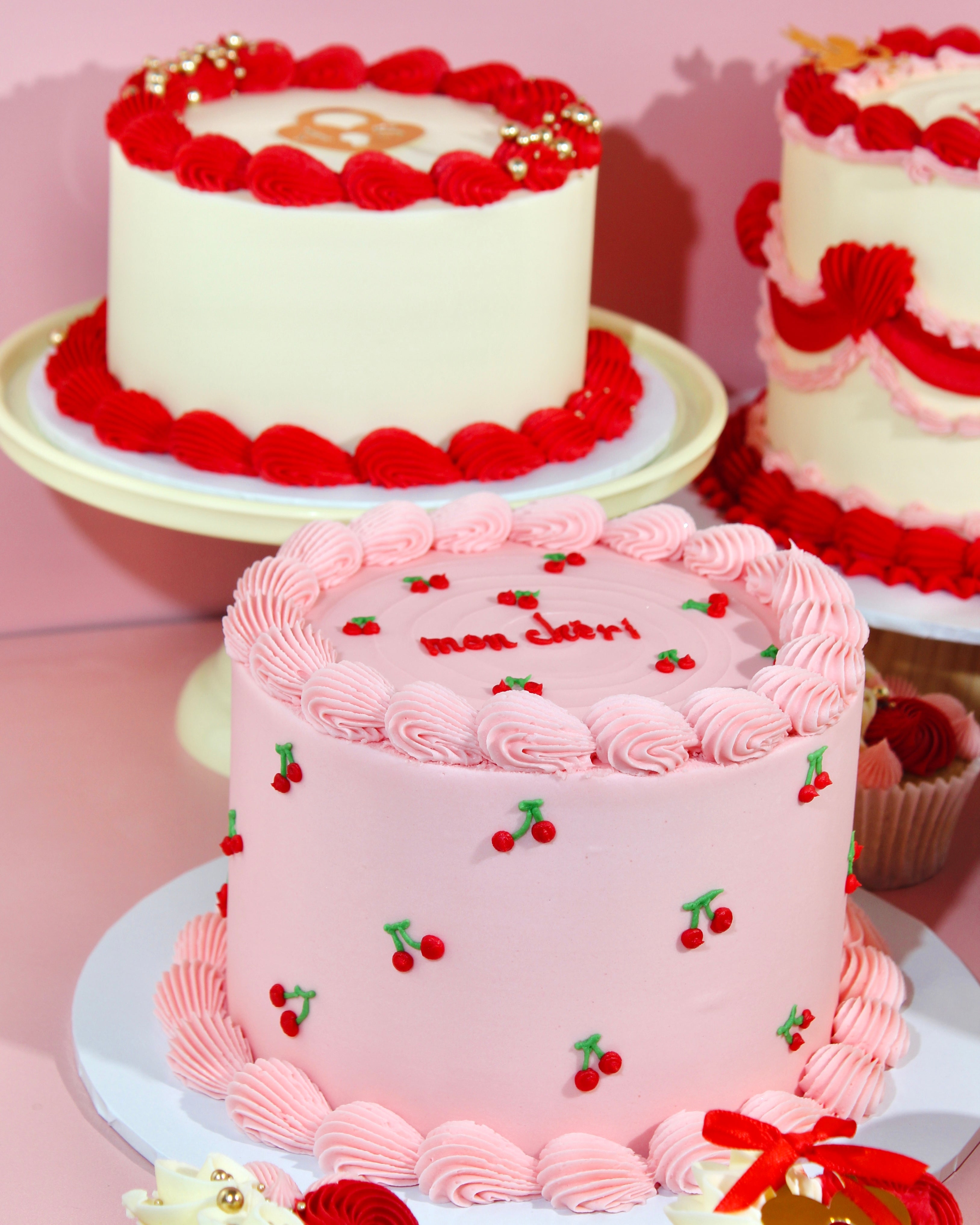 Mon Chèri Valentine’s cake with blush pink buttercream and cherry design