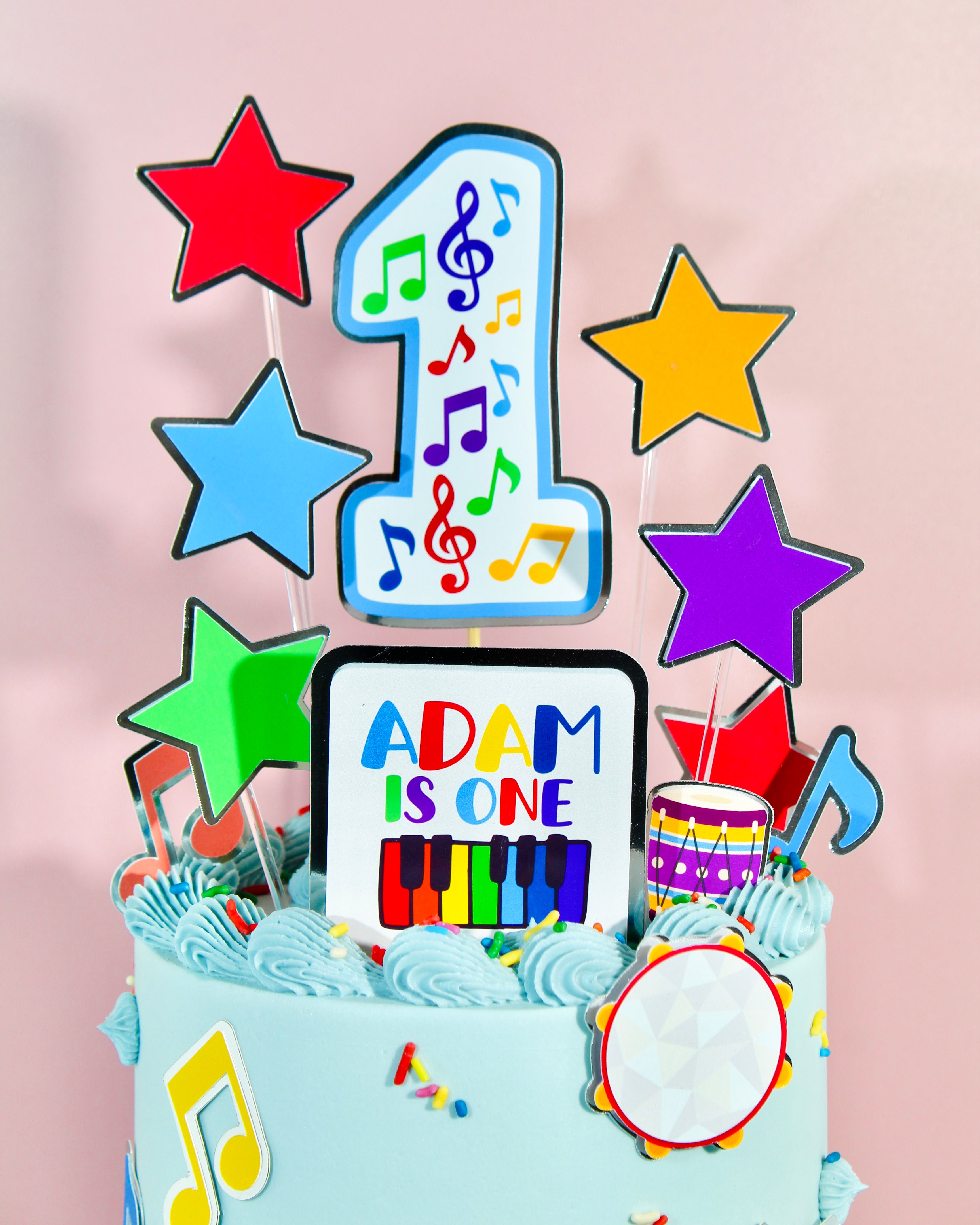 Personalised music cake with name and age topper and pastel blue buttercream