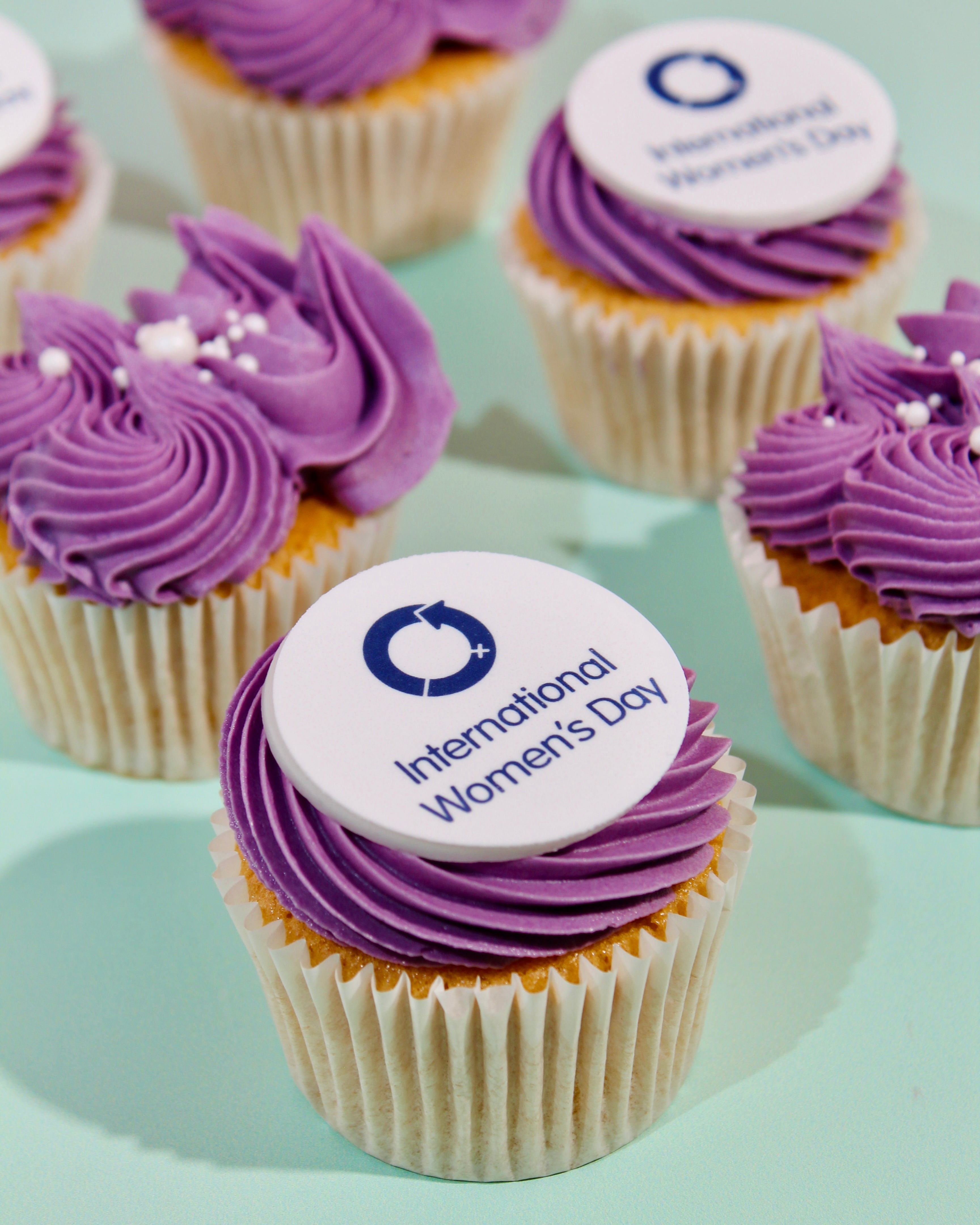Branded International Women’s Day corporate cupcakes with custom logo