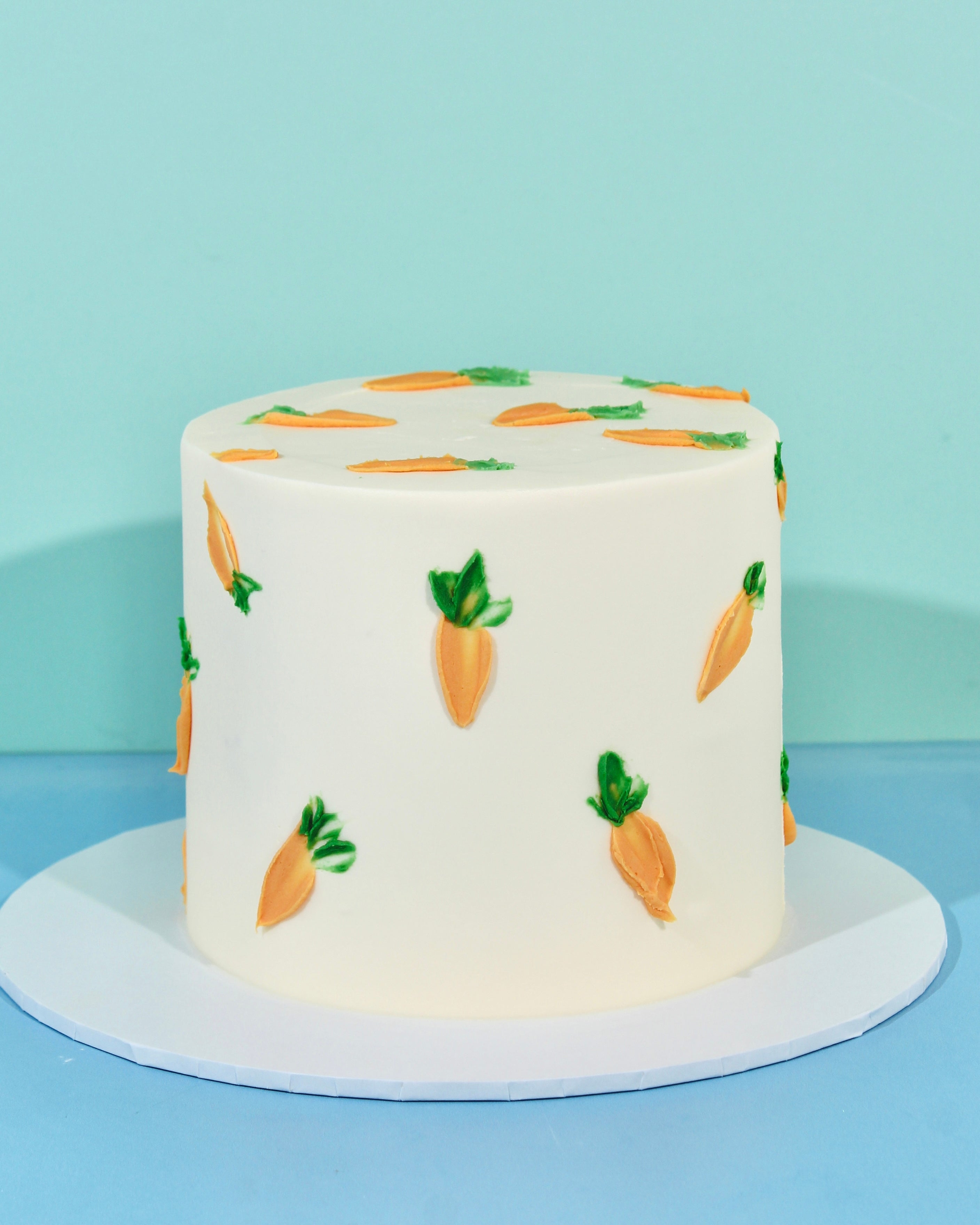 White Easter cake with carrot design